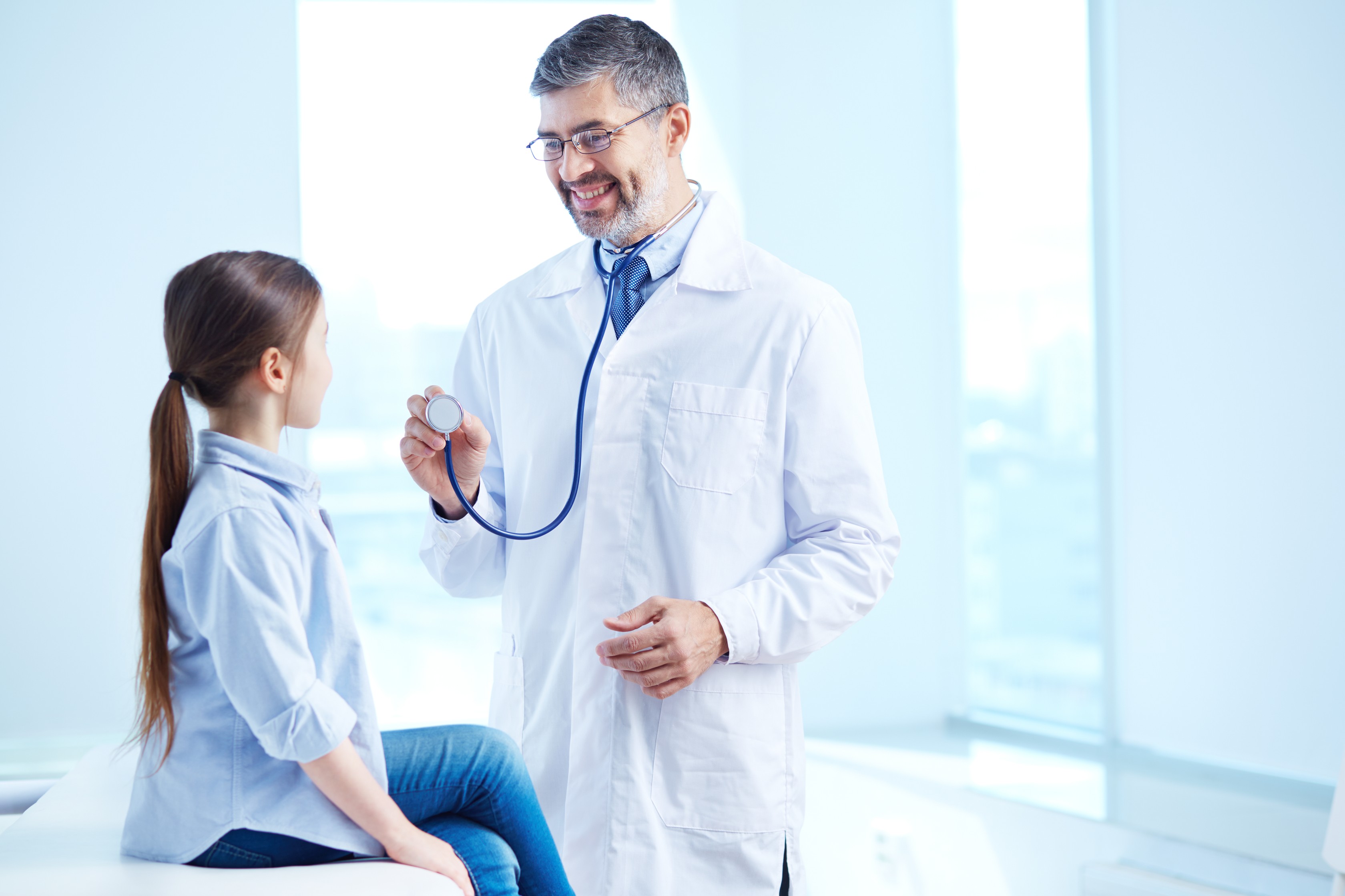 Happy doctor and patient